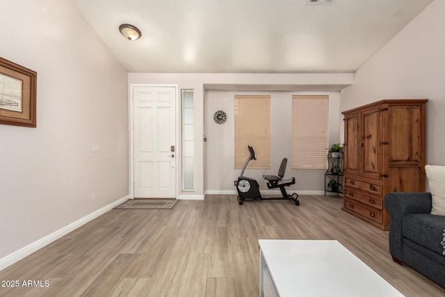 exercise area featuring light wood-type flooring