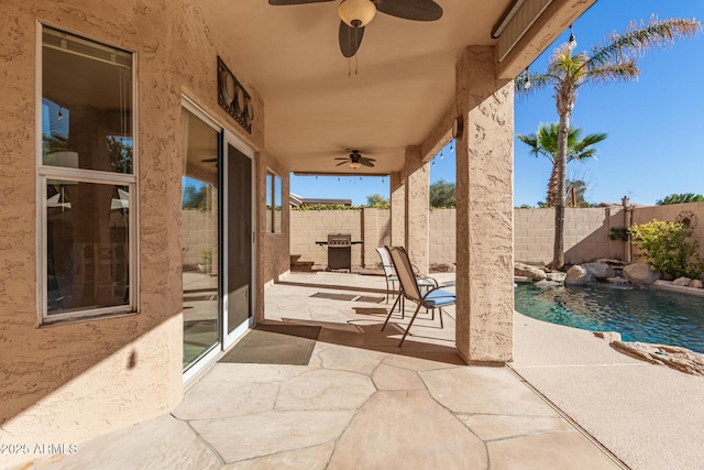 view of patio featuring grilling area, pool water feature, and ceiling fan