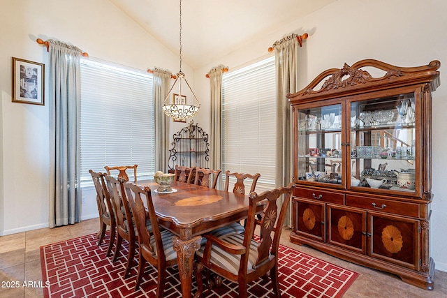 4554 W Detroit St, Chandler, AZ 85226 - dining area with a healthy amount of sunlight, an inviting chandelier, baseboards, and lofted ceiling