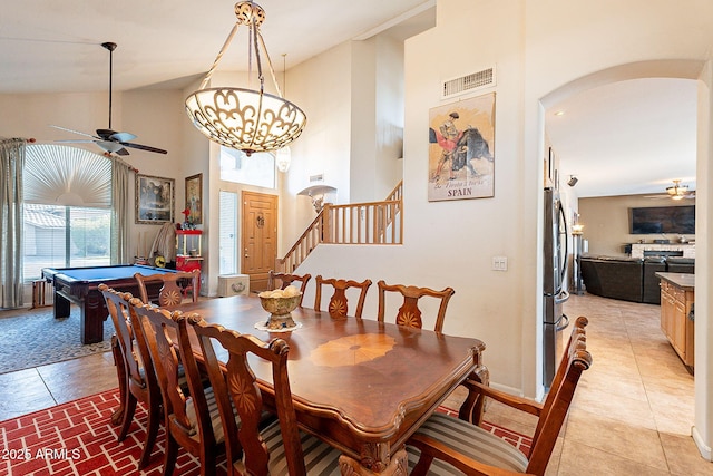 4554 W Detroit St, Chandler, AZ 85226 - dining area with stairway, a ceiling fan, light tile patterned flooring, visible vents, and arched walkways