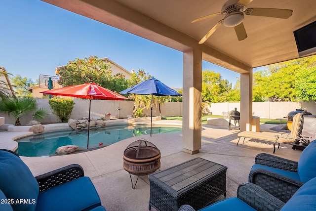 4554 W Detroit St, Chandler, AZ 85226 - view of patio featuring an outdoor fire pit, a fenced backyard, a fenced in pool, and a ceiling fan