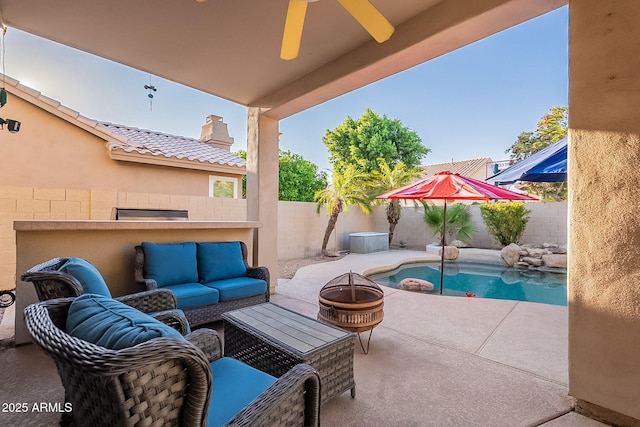 4554 W Detroit St, Chandler, AZ 85226 - view of patio / terrace with an outdoor living space with a fire pit, a fenced backyard, ceiling fan, and a fenced in pool