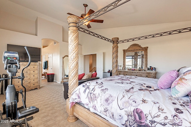 4554 W Detroit St, Chandler, AZ 85226 - bedroom featuring baseboards, arched walkways, ceiling fan, high vaulted ceiling, and light colored carpet