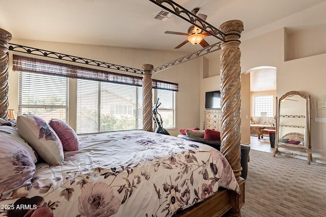 4554 W Detroit St, Chandler, AZ 85226 - carpeted bedroom featuring arched walkways, visible vents, multiple windows, and vaulted ceiling