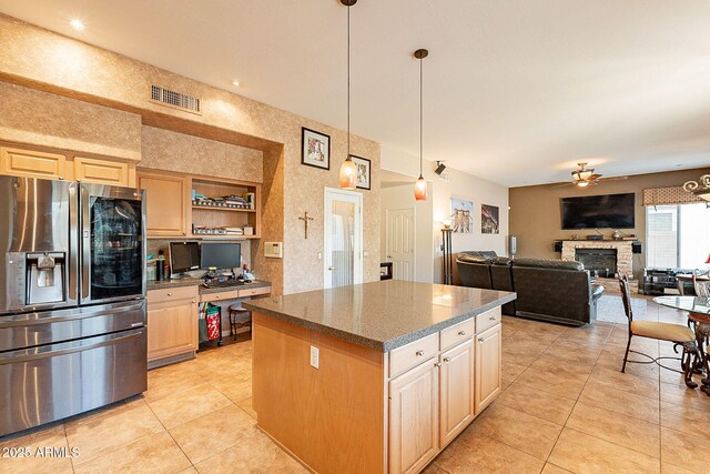 4554 W Detroit St, Chandler, AZ 85226 - kitchen featuring stainless steel fridge with ice dispenser, a fireplace, light tile patterned floors, visible vents, and ceiling fan