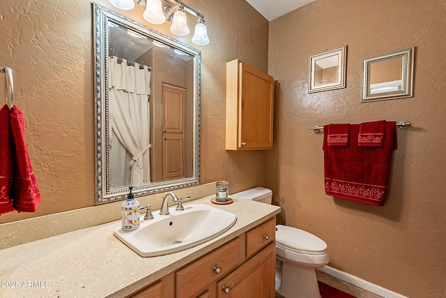 4554 W Detroit St, Chandler, AZ 85226 - full bath with toilet, curtained shower, vanity, and a textured wall