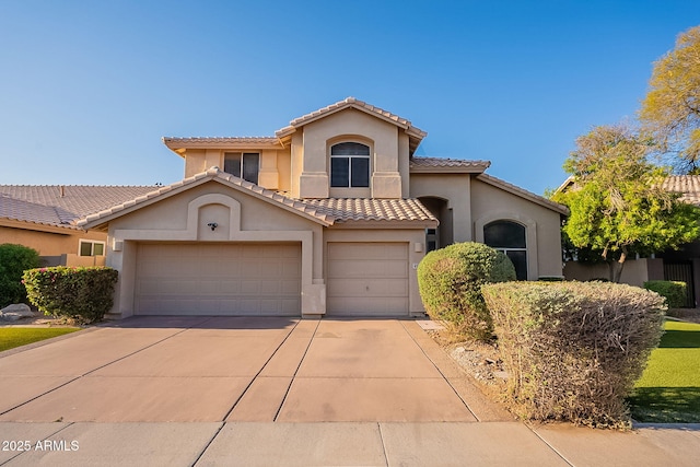 4554 W Detroit St, Chandler, AZ 85226 - mediterranean / spanish house featuring an attached garage, a tiled roof, concrete driveway, and stucco siding