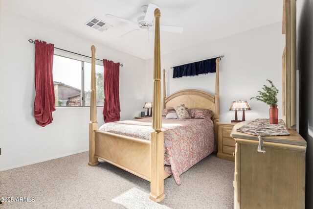 bedroom with light carpet, ceiling fan, and visible vents