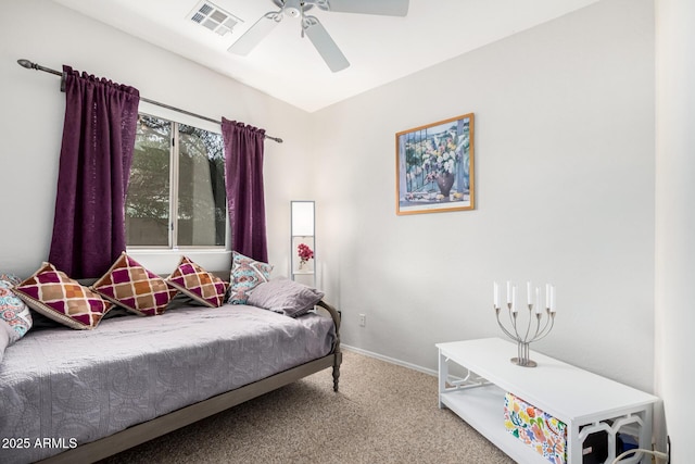 bedroom featuring carpet floors, a ceiling fan, visible vents, and baseboards