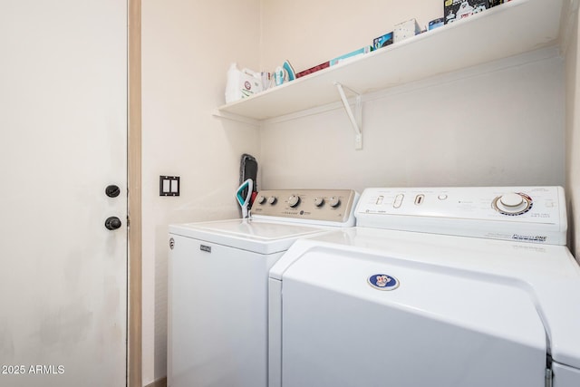 laundry room featuring laundry area and separate washer and dryer