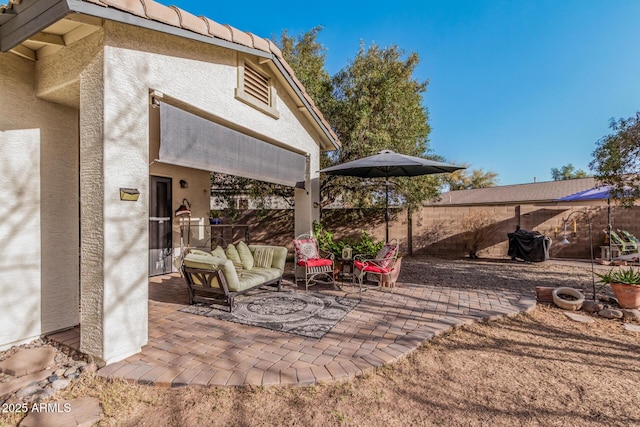 view of patio / terrace with fence