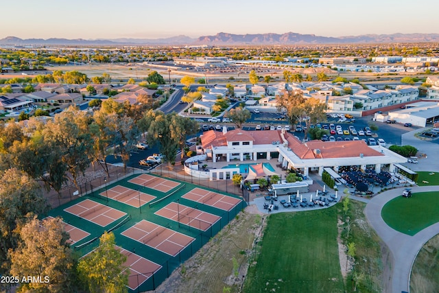 drone / aerial view featuring a residential view and a mountain view