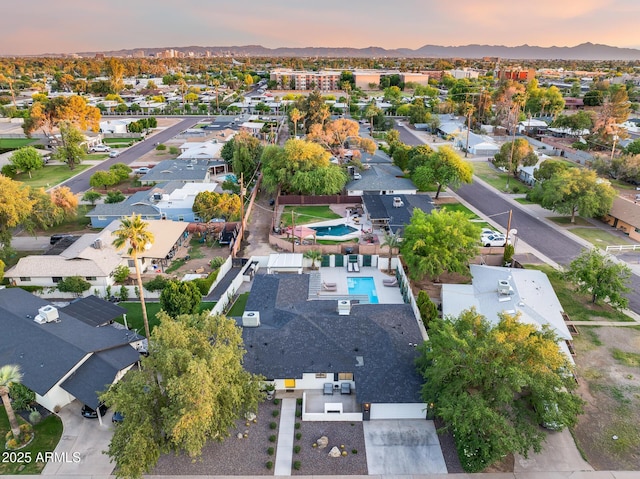 birds eye view of property featuring a residential view and a mountain view