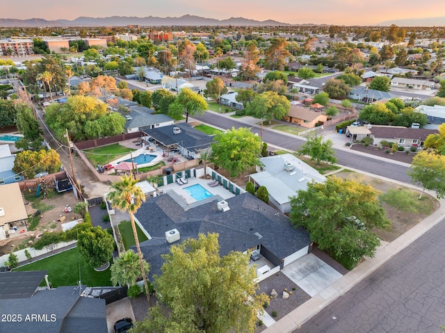 bird's eye view featuring a mountain view and a residential view