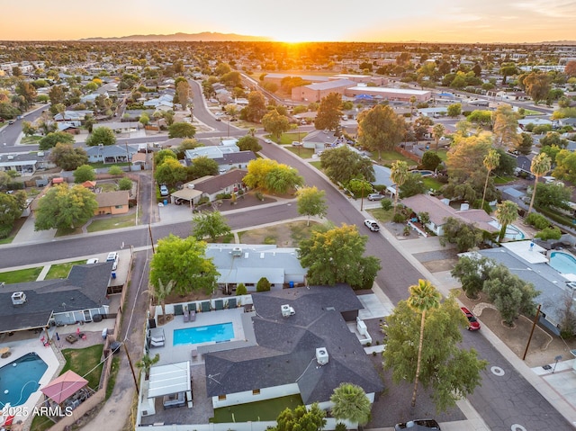 aerial view at dusk with a residential view
