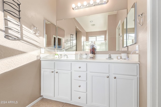 bathroom featuring vanity and tile patterned flooring