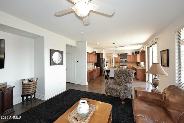 living room featuring ceiling fan