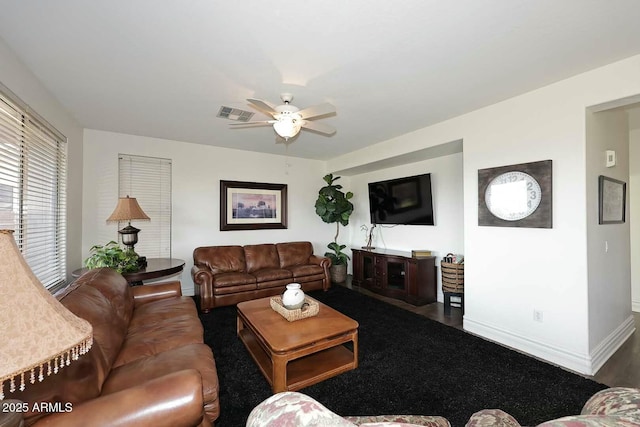 living room with ceiling fan