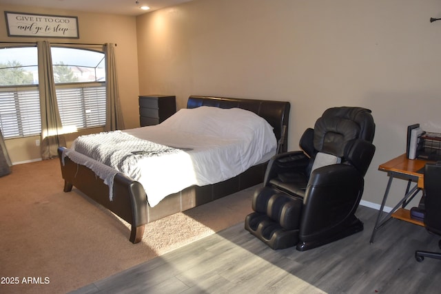 bedroom featuring hardwood / wood-style floors