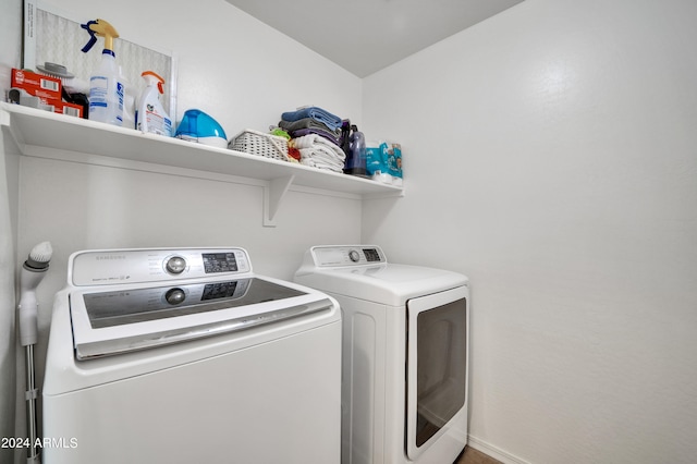 laundry room with washer and dryer