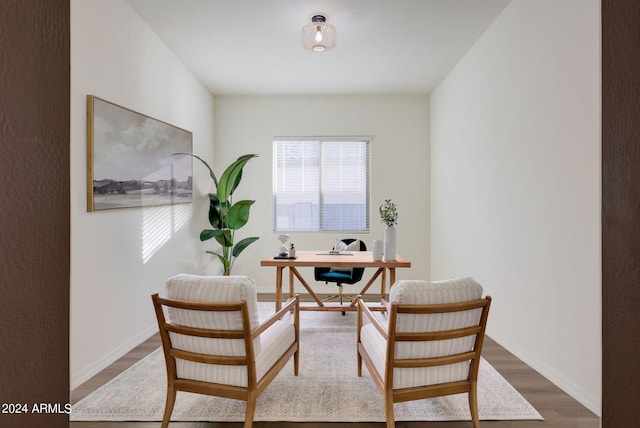 office space with hardwood / wood-style flooring