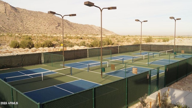 view of sport court with a mountain view