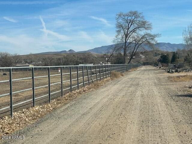 view of street featuring a mountain view and a rural view