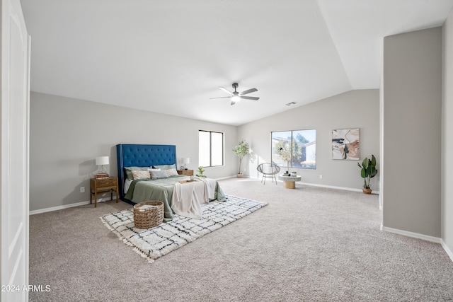 bedroom featuring ceiling fan, carpet, and lofted ceiling