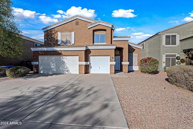 front facade with a garage