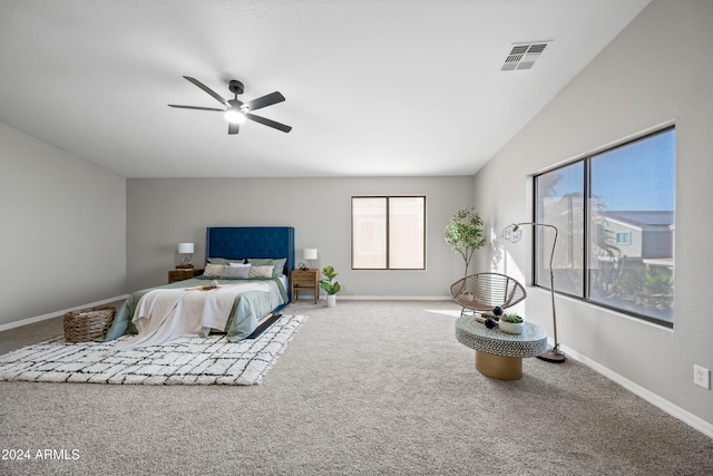 bedroom with carpet flooring, ceiling fan, and lofted ceiling