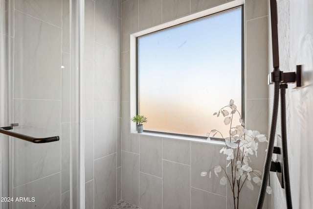 bathroom with an enclosed shower