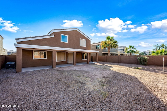 back of property with a patio area