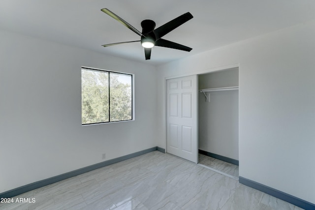 unfurnished bedroom with a closet and ceiling fan