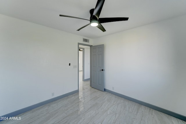 spare room featuring ceiling fan