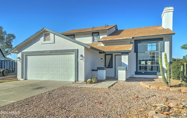 view of front of house with a garage