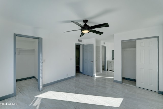 unfurnished bedroom featuring ensuite bath and ceiling fan