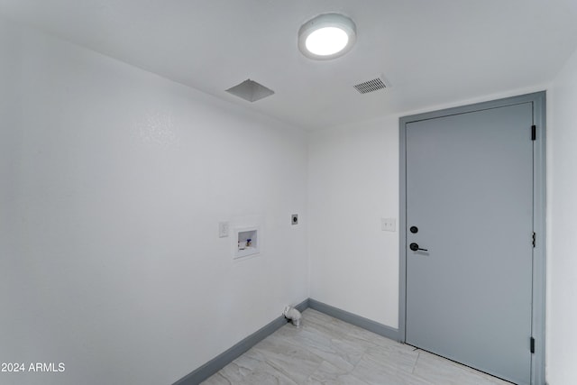 clothes washing area featuring hookup for an electric dryer and hookup for a washing machine