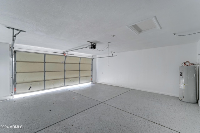 garage featuring electric water heater and a garage door opener