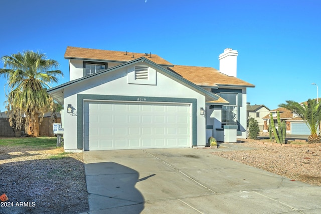 view of front of house with a garage