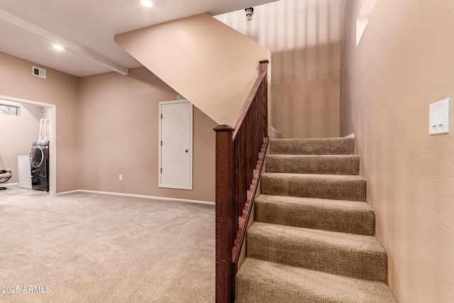 staircase featuring visible vents, washer / clothes dryer, recessed lighting, carpet flooring, and baseboards