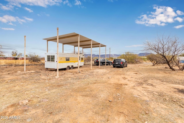 view of outdoor structure with a carport