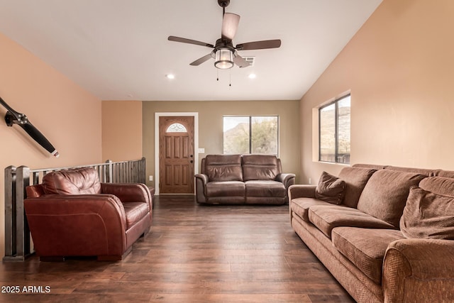 living room featuring a ceiling fan, vaulted ceiling, recessed lighting, and dark wood-style floors