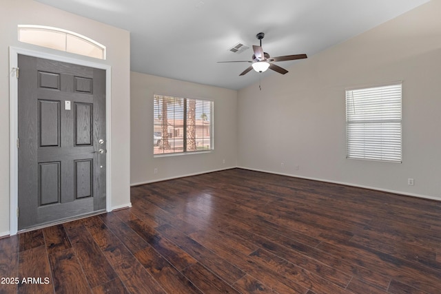 9231 W Grovers Ave, Peoria, AZ 85382 - entryway with dark wood-type flooring, a ceiling fan, vaulted ceiling, and baseboards