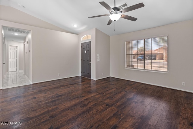 9231 W Grovers Ave, Peoria, AZ 85382 - spare room with lofted ceiling, wood finished floors, a ceiling fan, and baseboards
