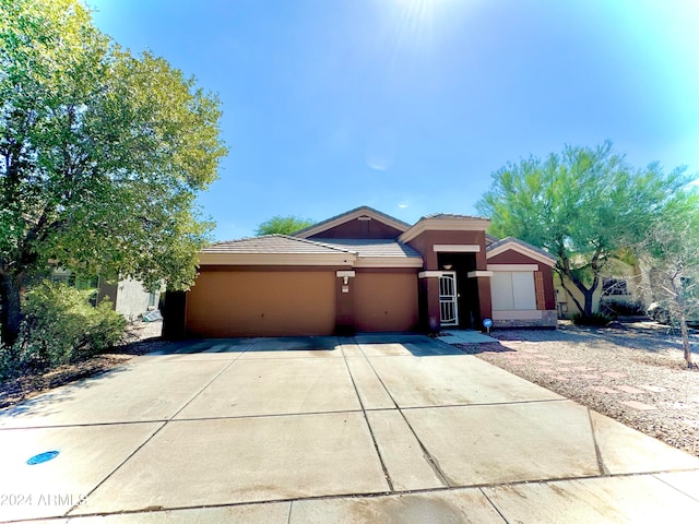 view of front of property featuring a garage