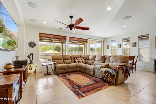 tiled living room with beverage cooler and ceiling fan