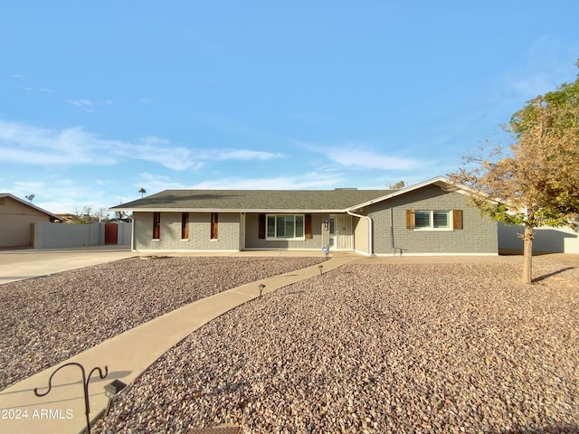 ranch-style home featuring a patio area