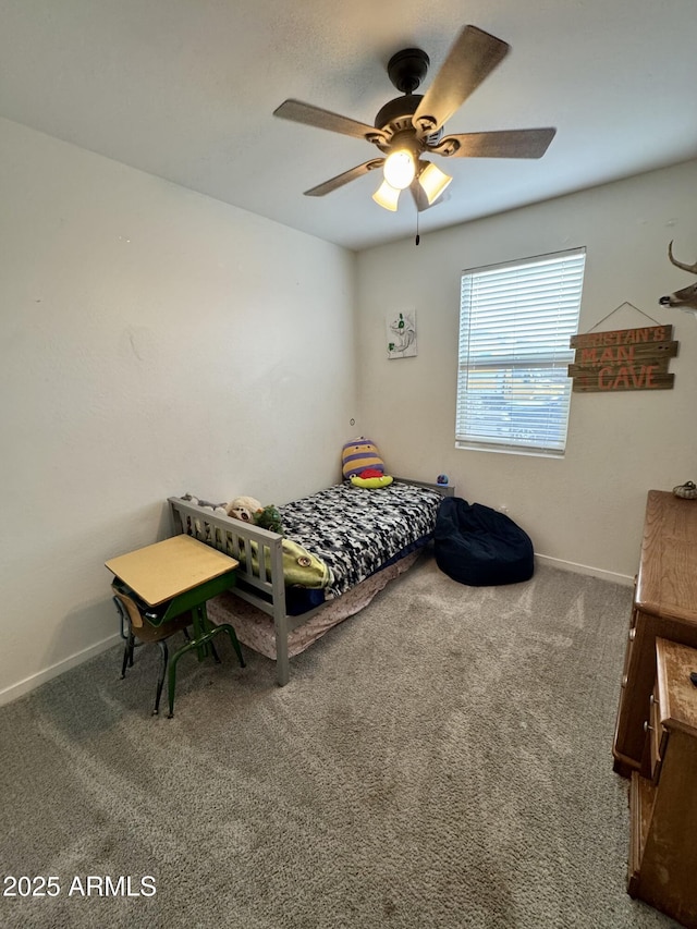 bedroom featuring carpet floors, baseboards, and a ceiling fan