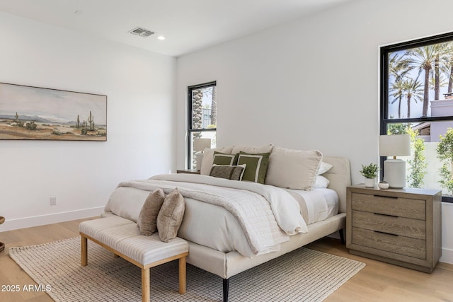 4301 E Sells Dr, Phoenix, AZ 85018 - bedroom featuring light wood-style flooring, recessed lighting, and baseboards