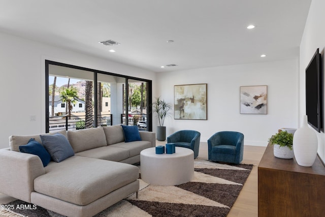 4301 E Sells Dr, Phoenix, AZ 85018 - living room featuring recessed lighting and light wood-style flooring